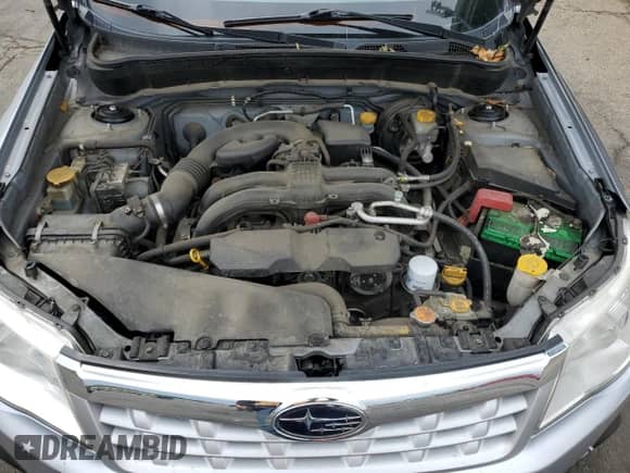 2012 Subaru Forester X Premium z VIN JF2SHBDC9CG422928, wystawiony jako Copart lot #58148675 z przebiegiem 57 652 mil mil oraz Szkoda całkowita • Salvage title. Historia ofert i sprzedaży dostępna na DreamBid. Obrazek 11.