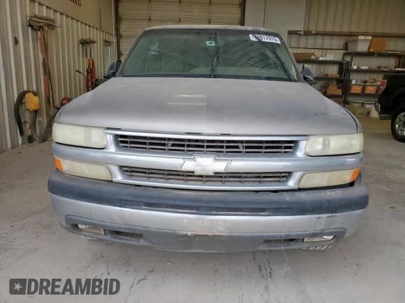 2003 Chevrolet Suburban LT z VIN 1GNEC16Z23J248958, wystawiony jako Copart lot #70917915 z przebiegiem 132 923 mil mil oraz Czysty tytuł • Clean title. Historia ofert i sprzedaży dostępna na DreamBid. Obrazek 5.