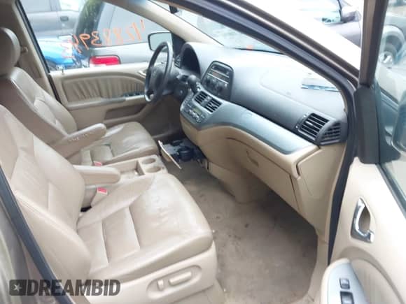 2008 Honda Odyssey EX-L with VIN 5FNRL38658B415420, listed as a IAAI auction lot 42883943 with 244,151 mi miles and . Bid and sale history available at DreamBid. Image 5.