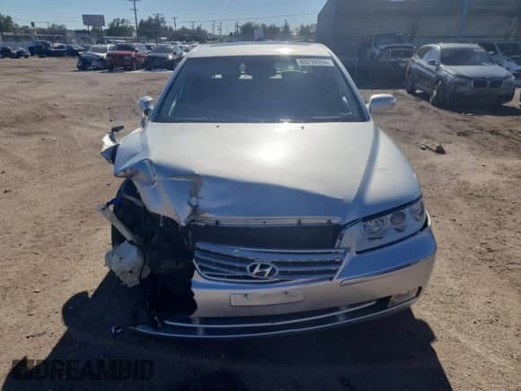 2007 Hyundai Azera SE с VIN KMHFC46F47A182080, выставлен на аукционе Copart как лот 80299994 с пробегом 137 689 миль миль и Списание • Salvage title. История ставок и продаж доступна на DreamBid. Изображение 5.