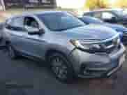 2020 Honda Pilot EX z VIN 5FNYF5H38LB010438, wystawiony jako IAAI lot #43196412 z przebiegiem 64 526 mil mil oraz . Historia ofert i sprzedaży dostępna na DreamBid. Obrazek 1.