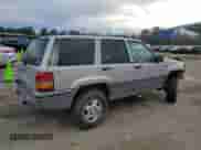 1995 Jeep Grand Cherokee Laredo with VIN 1J4GZ58S7SC517783, listed as a Copart auction lot 43057145 with 225,273 mi miles and Salvage title. Bid and sale history available at DreamBid. Image 3.