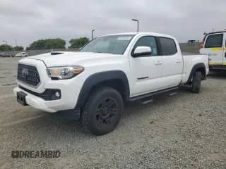 2019 Toyota Tacoma SR5 with VIN 3TMBZ5DN9KM018322, listed as a Copart auction lot 56730125 with 135,156 mi miles and Salvage title. Bid and sale history available at DreamBid. Image 1.