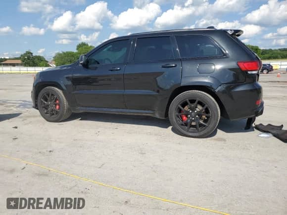 2016 Jeep Grand Cherokee SRT с VIN 1C4RJFDJ9GC503741, выставлен на аукционе Copart как лот 61945705 с пробегом 119 546 миль миль и Списание • Salvage title. История ставок и продаж доступна на DreamBid. Изображение 2.