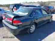 2001 Honda Accord LX with VIN 1HGCG56411A034459, listed as a IAAI auction lot 42248215 with 179,408 mi miles and . Bid and sale history available at DreamBid. Image 4.