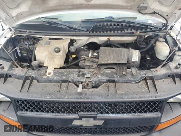 2003 Chevrolet Express Passenger с VIN 1GNFG15T531190575, выставлен на аукционе Copart как лот 74769654 с пробегом Не указан миль и Списание • Salvage title. История ставок и продаж доступна на DreamBid. Изображение 11.