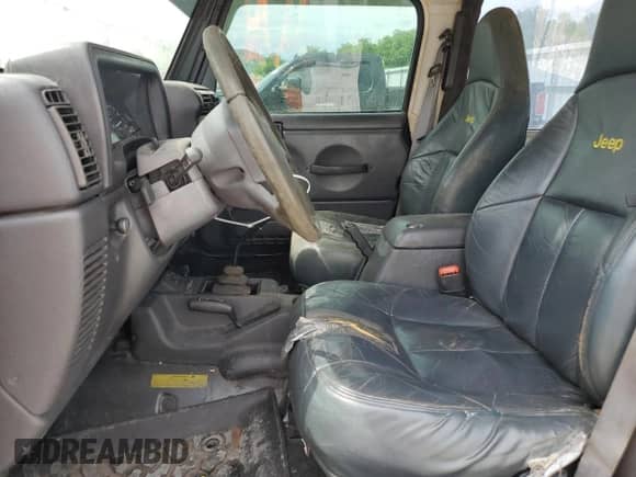 2000 Jeep Wrangler Sport z VIN 1J4FA49S7YP741858, wystawiony jako Copart lot #59058075 z przebiegiem 223 876 mil mil oraz Czysty tytuł • Clean title. Historia ofert i sprzedaży dostępna na DreamBid. Obrazek 7.