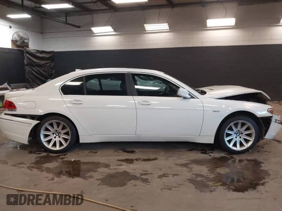 2003 BMW 7 Series 745Li z VIN WBAGN63463DR08268, wystawiony jako IAAI lot #41355287 z przebiegiem 210 333 mil mil oraz . Historia ofert i sprzedaży dostępna na DreamBid. Obrazek 13.