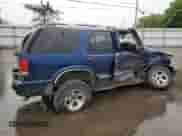 2001 Chevrolet Blazer LT with VIN 1GNDT13W71K236849, listed as a Copart auction lot 57553045 with Not provided miles and Salvage title. Bid and sale history available at DreamBid. Image 3.