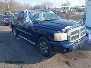 2007 Dodge Dakota SLT with VIN 1D7HW48P97S197636, listed as a IAAI auction lot 41178157 with 130,695 mi miles and . Bid and sale history available at DreamBid. Image 1.