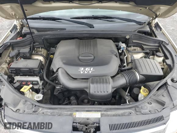 2012 Jeep Grand Cherokee Laredo z VIN 1C4RJFAG0CC156397, wystawiony jako Copart lot #87400775 z przebiegiem 165 192 mil mil oraz Szkoda całkowita • Salvage title. Historia ofert i sprzedaży dostępna na DreamBid. Obrazek 12.