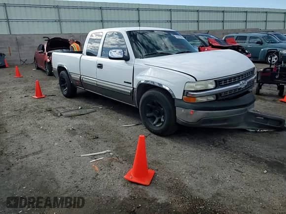 2000 Chevrolet Silverado 1500 LS z VIN 2GCEC19T4Y1212805, wystawiony jako Copart lot #63391605 z przebiegiem 198 139 mil mil oraz Szkoda całkowita • Salvage title. Historia ofert i sprzedaży dostępna na DreamBid. Obrazek 13.