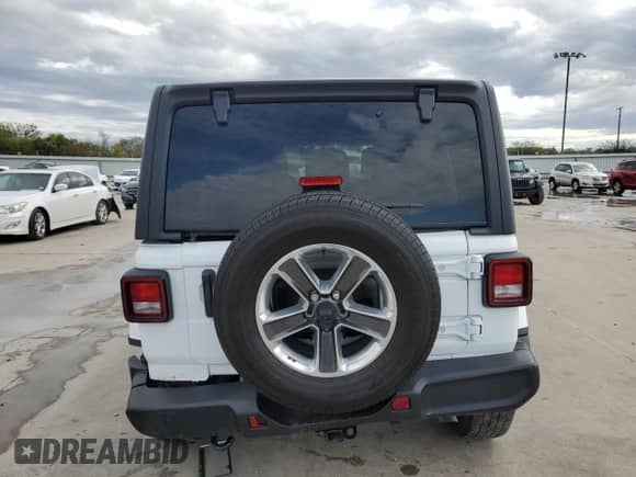 2023 Jeep Wrangler Sahara Altitude with VIN 1C4HJXEG5PW570629, listed as a Copart auction lot 80860234 with 15,121 mi miles and Salvage title. Bid and sale history available at DreamBid. Image 6.