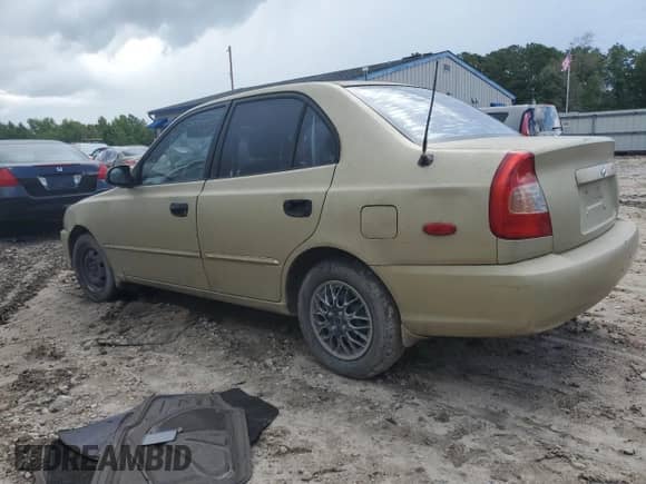 2002 Hyundai Accent GL z VIN KMHCG45C02U296132, wystawiony jako Copart lot #59401835 z przebiegiem 115 421 mil mil oraz Czysty tytuł • Clean title. Historia ofert i sprzedaży dostępna na DreamBid. Obrazek 2.