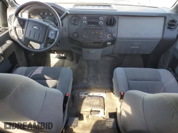 2015 Ford F-250 XLT with VIN 1FT7X2B69FEC27156, listed as a Copart auction lot 71694195 with 228,807 mi miles and Salvage title. Bid and sale history available at DreamBid. Image 8.