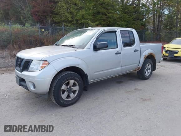 2013 Nissan Frontier SV with VIN 1N6AD0EV3DN738488, listed as a IAAI auction lot 43396900 with 254,839 mi miles and . Bid and sale history available at DreamBid. Image 2.