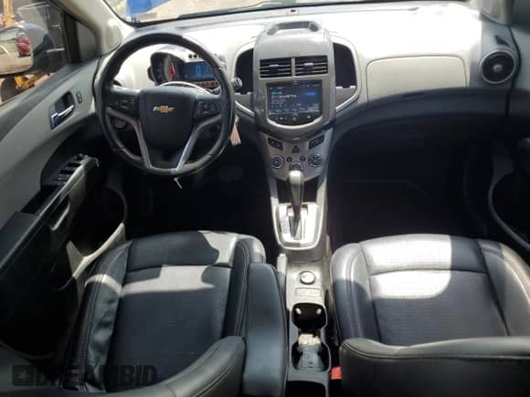 2014 Chevrolet Sonic LTZ с VIN 1G1JE6SB7E4221675, выставлен на аукционе Copart как лот 66685495 с пробегом 142 096 миль миль и Списание • Salvage title. История ставок и продаж доступна на DreamBid. Изображение 8.
