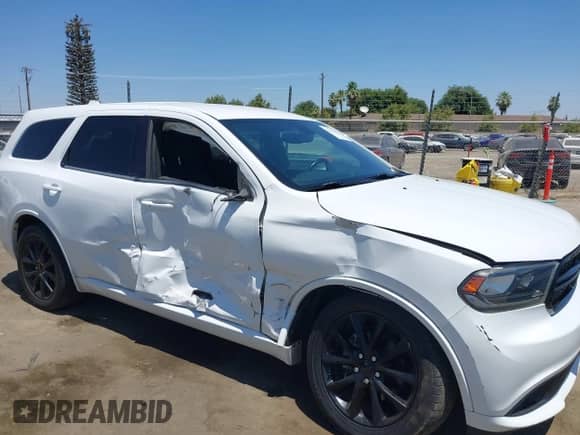 2018 Dodge Durango SXT with VIN 1C4RDHAG5JC261582, listed as a IAAI auction lot 42759963 with 114,002 mi miles and . Bid and sale history available at DreamBid. Image 14.