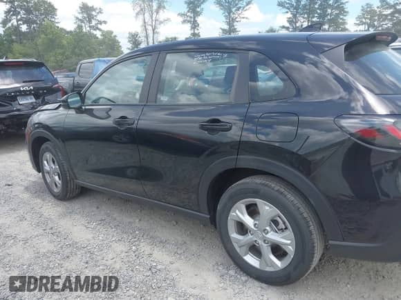 2025 Honda HR-V LX with VIN 3CZRZ1H38SM754677, listed as a IAAI auction lot 42694829 with 1,938 mi miles and . Bid and sale history available at DreamBid. Image 14.