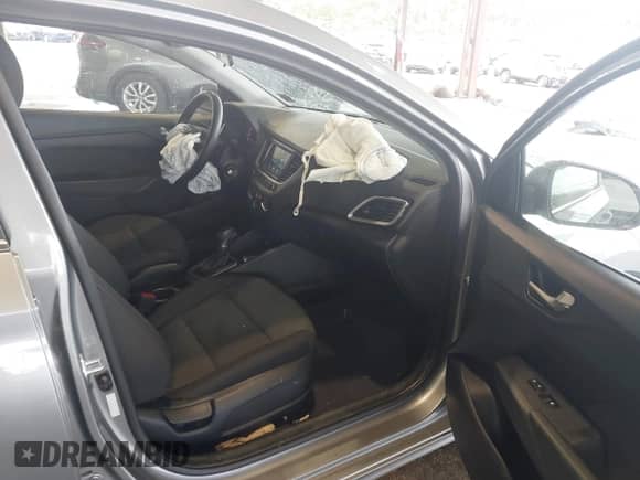 2022 Hyundai Accent SE z VIN 3KPC24A60NE179043, wystawiony jako IAAI lot #42313448 z przebiegiem 66 700 mil mil oraz . Historia ofert i sprzedaży dostępna na DreamBid. Obrazek 5.