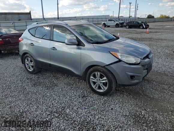 2011 Hyundai Tucson GLS with VIN KM8JU3AC9BU169296, listed as a Copart auction lot 81872225 with 233,358 mi miles and Salvage title. Bid and sale history available at DreamBid. Image 4.