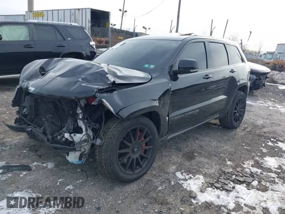 2017 Jeep Grand Cherokee SRT with VIN 1C4RJFDJ7HC641926, listed as a IAAI auction lot 41272215 with 117,667 mi miles and . Bid and sale history available at DreamBid. Image 2.