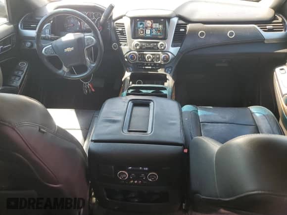 2015 Chevrolet Suburban LTZ с VIN 1GNSKKKC8FR175386, выставлен на аукционе Copart как лот 69584055 с пробегом 178 879 миль миль и Списание • Salvage title. История ставок и продаж доступна на DreamBid. Изображение 8.