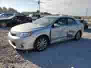 2014 Toyota Camry XLE with VIN 4T1BF1FK6EU842844, listed as a Copart auction lot 85161185 with 214,589 mi miles and Salvage title. Bid and sale history available at DreamBid. Image 1.