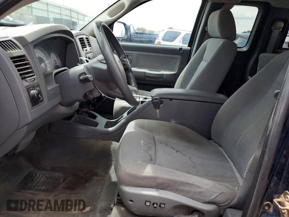 2006 Dodge Dakota с VIN 1D3HW42N46S612420, выставлен на аукционе Copart как лот 63764385 с пробегом 168 909 миль миль и Списание • Salvage title. История ставок и продаж доступна на DreamBid. Изображение 7.