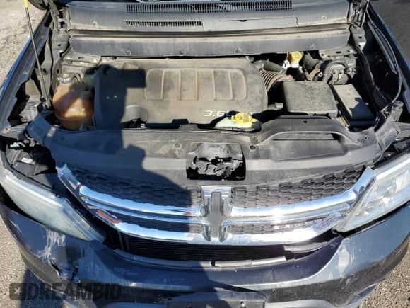2012 Dodge Journey Crew with VIN 3C4PDDDG9CT170866, listed as a Copart auction lot 71862665 with 144,686 mi miles and Salvage title. Bid and sale history available at DreamBid. Image 12.