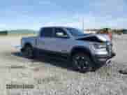 2020 Ram 1500 Rebel z VIN 1C6SRFLT7LN199084, wystawiony jako Copart lot #64990655 z przebiegiem 143 021 mil mil oraz Nie do naprawy • Non repairable. Historia ofert i sprzedaży dostępna na DreamBid. Obrazek 4.