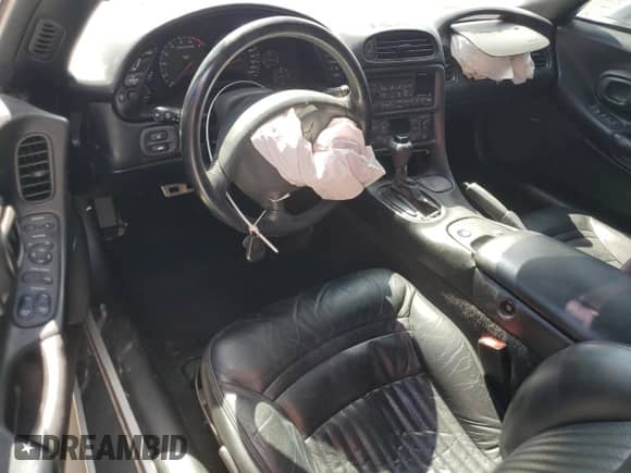 2002 Chevrolet Corvette с VIN 1G1YY22G725112830, выставлен на аукционе Copart как лот 61101095 с пробегом 127 734 миль миль и Списание • Salvage title. История ставок и продаж доступна на DreamBid. Изображение 8.