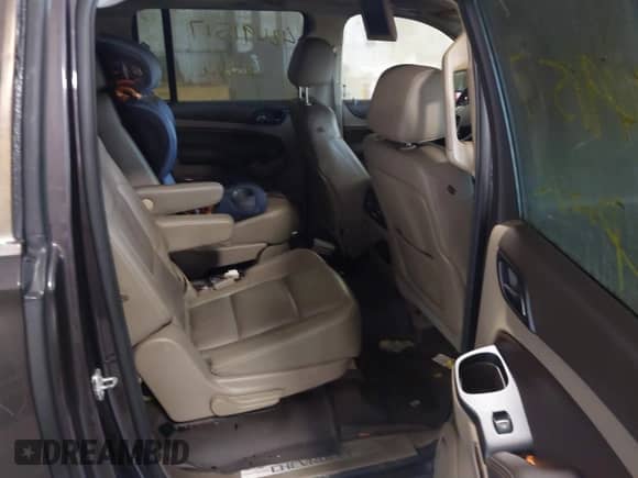 2015 Chevrolet Suburban LT z VIN 1GNSKJKC7FR515119, wystawiony jako IAAI lot #42491517 z przebiegiem 69 049 mil mil oraz . Historia ofert i sprzedaży dostępna na DreamBid. Obrazek 8.