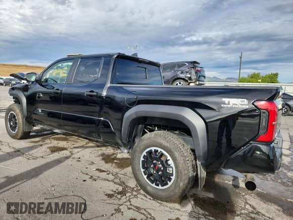 2024 Toyota Tacoma TRD Off Road with VIN 3TYLB5JN7RT057406, listed as a Copart auction lot 80080185 with 12,096 mi miles and Salvage title. Bid and sale history available at DreamBid. Image 2.