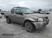 2003 Nissan Frontier XE with VIN 1N6ED27Y63C420461, listed as a Copart auction lot 54346365 with 140,727 mi miles and Salvage title. Bid and sale history available at DreamBid. Image 4.