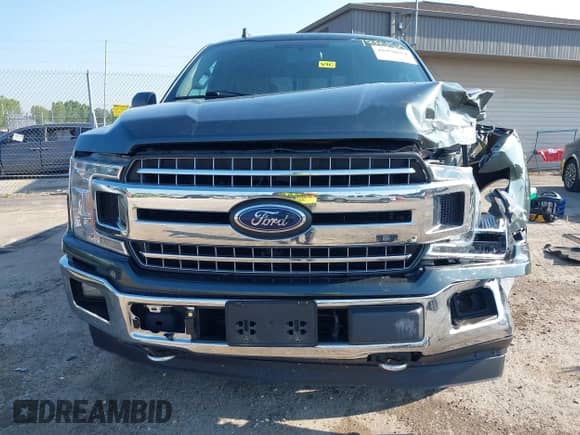 2018 Ford F-150 XLT z VIN 1FTEW1EG4JKC61072, wystawiony jako IAAI lot #42978854 z przebiegiem 126 442 mil mil oraz . Historia ofert i sprzedaży dostępna na DreamBid. Obrazek 12.