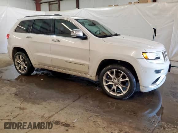 2016 Jeep Grand Cherokee Summit with VIN 1C4RJFJT1GC491042, listed as a Copart auction lot 69321305 with 138,005 mi miles and Clean title. Bid and sale history available at DreamBid. Image 4.