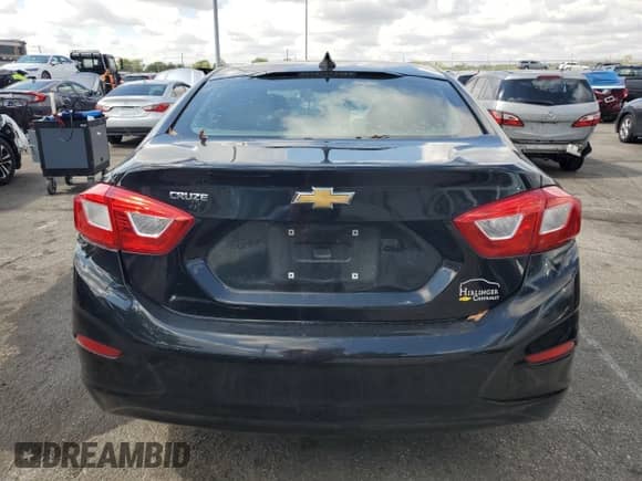 2017 Chevrolet Cruze LS with VIN 1G1BC5SM8H7146686, listed as a Copart auction lot 81098405 with 108,675 mi miles and Salvage title. Bid and sale history available at DreamBid. Image 6.
