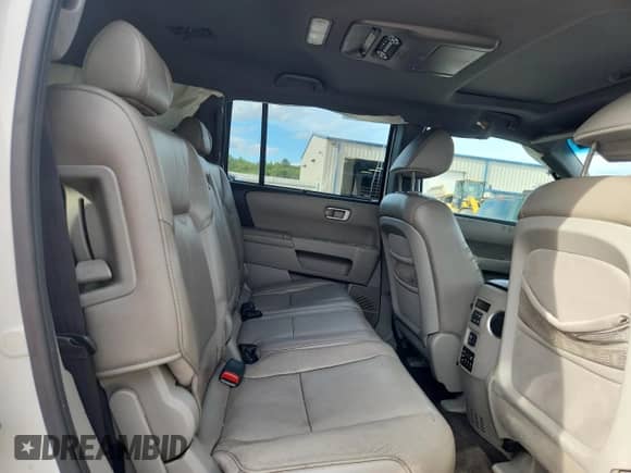 2011 Honda Pilot Touring с VIN 5FNYF3H94BB029768, выставлен на аукционе Copart как лот 71886275 с пробегом 186 127 миль миль и Списание • Salvage title. История ставок и продаж доступна на DreamBid. Изображение 11.