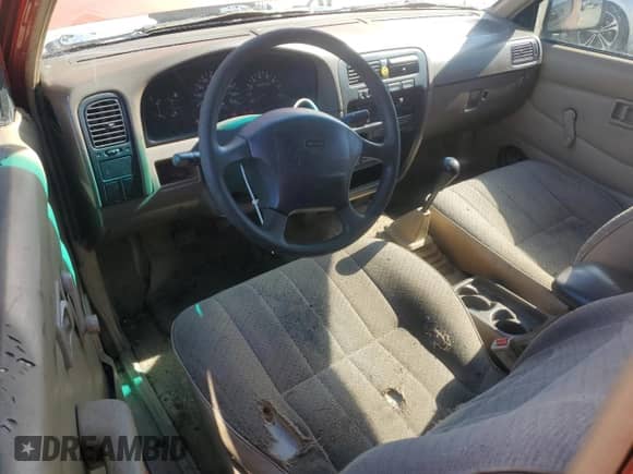 1997 Nissan Frontier XE with VIN 1N6SD16S4VC395458, listed as a Copart auction lot 85908625 with 220,913 mi miles and Clean title. Bid and sale history available at DreamBid. Image 8.