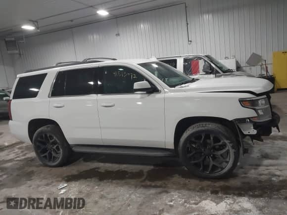 2018 Chevrolet Tahoe LS with VIN 1GNSKAKC5JR379467, listed as a IAAI auction lot 41513072 with 112,184 mi miles and . Bid and sale history available at DreamBid. Image 14.