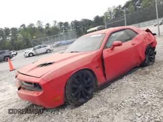 2014 Dodge Challenger SRT-8 Core с VIN 2C3CDYDJ3EH205242, выставлен на аукционе Copart как лот 50713025 с пробегом 129 089 миль миль и Списание • Salvage title. История ставок и продаж доступна на DreamBid. Изображение 1.