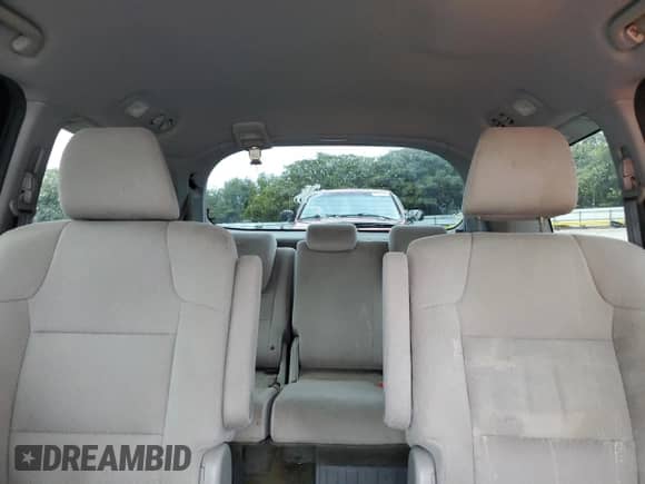 2014 Honda Odyssey LX z VIN 5FNRL5H28EB126388, wystawiony jako Copart lot #70583975 z przebiegiem 148 425 mil mil oraz Szkoda całkowita • Salvage title. Historia ofert i sprzedaży dostępna na DreamBid. Obrazek 10.