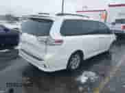 2015 Toyota Sienna SE with VIN 5TDXK3DC5FS583833, listed as a IAAI auction lot 41577726 with 143,965 mi miles and . Bid and sale history available at DreamBid. Image 4.