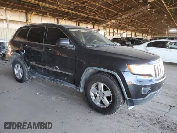 2011 Jeep Grand Cherokee Laredo с VIN 1J4RR4GG3BC660942, выставлен на аукционе Copart как лот 82198165 с пробегом 174 604 миль миль и Списание • Salvage title. История ставок и продаж доступна на DreamBid. Изображение 4.