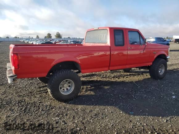 1996 Ford F-150 with VIN 1FTEX14N7TKA17710, listed as a Copart auction lot 76341824 with 215,390 mi miles and Salvage title. Bid and sale history available at DreamBid. Image 3.