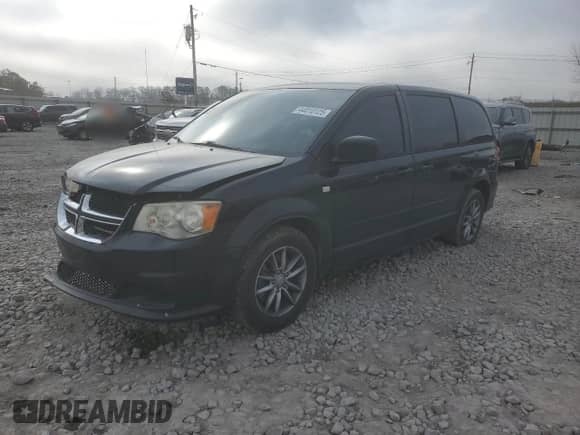 2014 Dodge Grand Caravan SXT with VIN 2C4RDGBG2ER251033, listed as a Copart auction lot 44010125 with 121,149 mi miles and Salvage title. Bid and sale history available at DreamBid. Image 1.