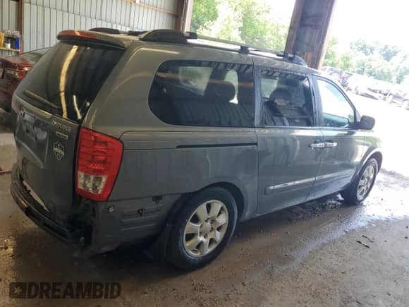 2008 Hyundai Entourage GLS z VIN KNDMC233686044961, wystawiony jako Copart lot #61937065 z przebiegiem 172 838 mil mil oraz Szkoda całkowita • Salvage title. Historia ofert i sprzedaży dostępna na DreamBid. Obrazek 3.