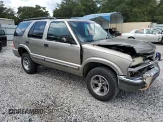 2001 Chevrolet Blazer LT z VIN 1GNCS13W512145867, wystawiony jako Copart lot #71829304 z przebiegiem 358 800 mil mil oraz Szkoda całkowita • Salvage title. Historia ofert i sprzedaży dostępna na DreamBid. Obrazek 4.
