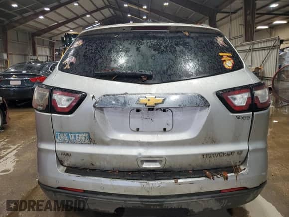 2016 Chevrolet Traverse LT z VIN 1GNKVHKD1GJ104744, wystawiony jako Copart lot #63876775 z przebiegiem Nie podano mil oraz Szkoda całkowita • Salvage title. Historia ofert i sprzedaży dostępna na DreamBid. Obrazek 6.